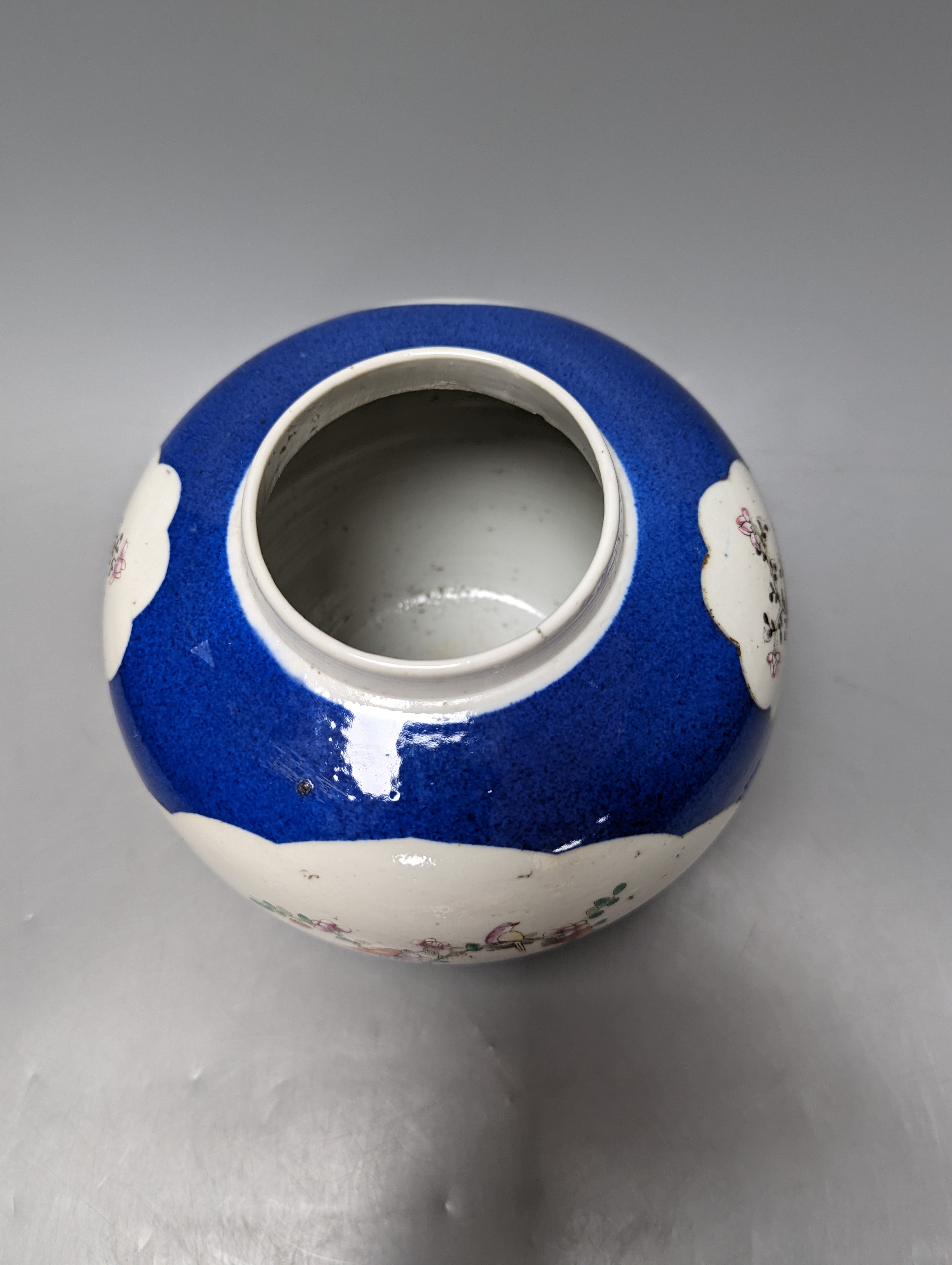 A Chinese blue ground jar and cover, 19th century, Qianlong mark to base, 20cm high